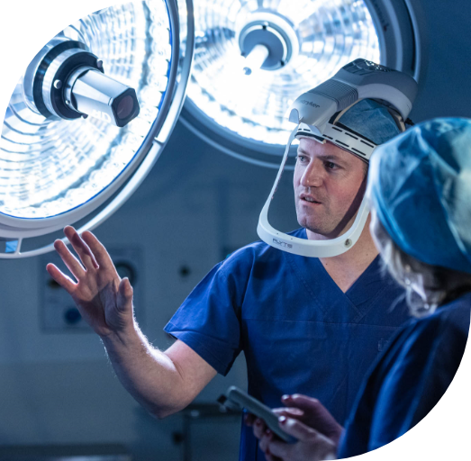 Orthopaedic surgeon in operating theatre performing knee or hip surgery – workers compensation procedure